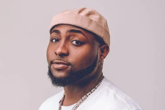 Rapper Erigga’s ‘family money’ post triggers debate as Davido hits back